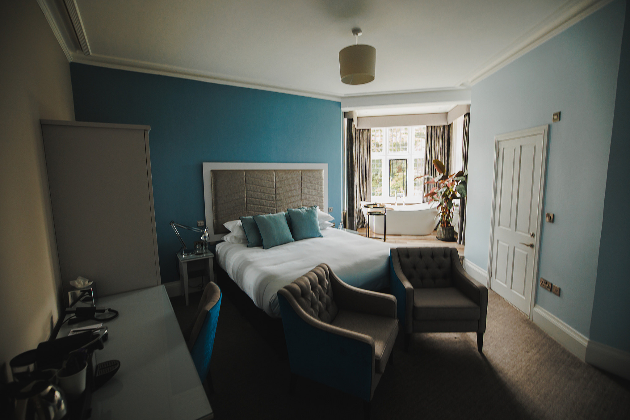 SOHA Retreats | The Autumn Reset Bedroom with a freestanding bath in the window bay
