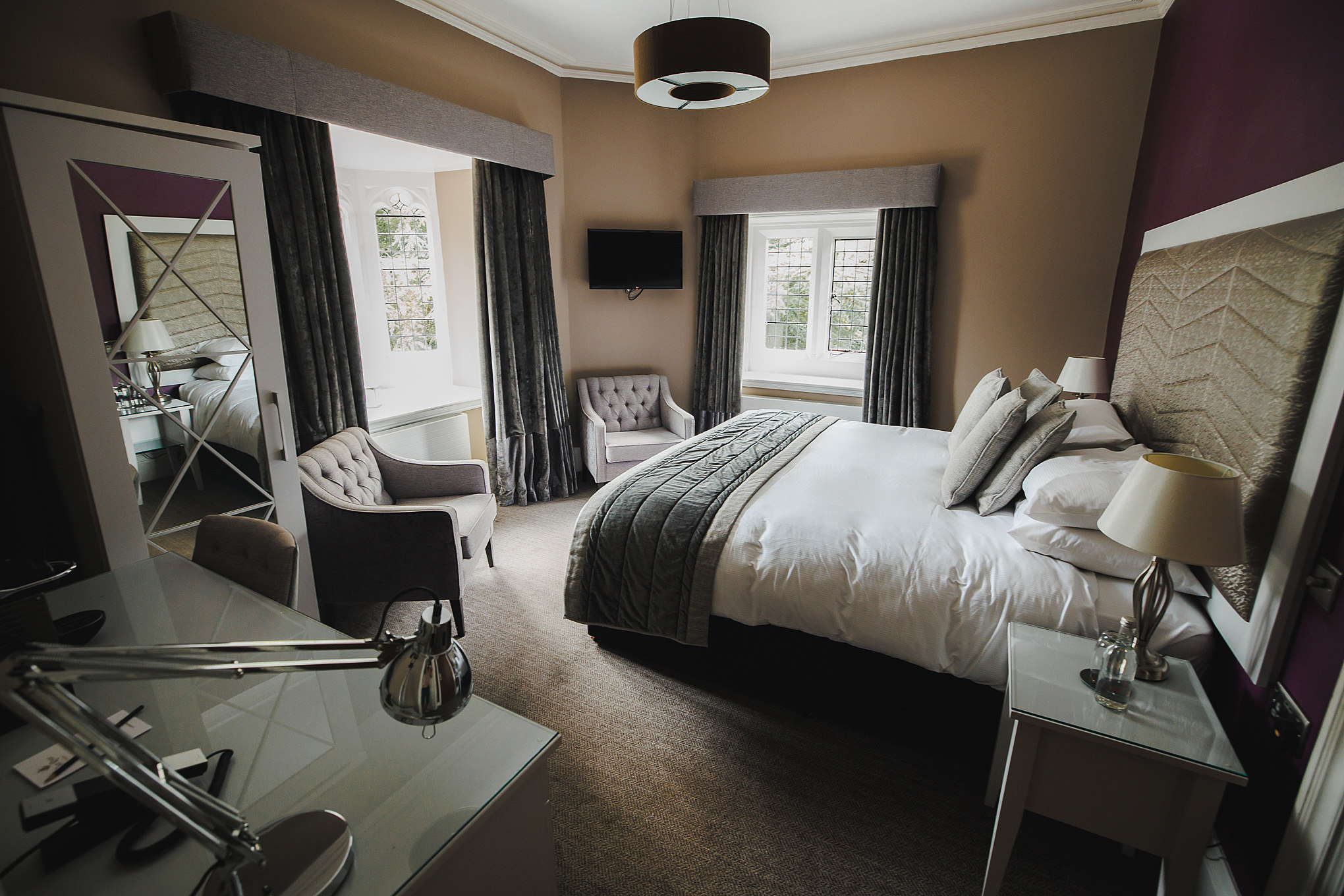 SOHA Retreats | The Autumn Reset Spacious master bedroom with armchairs